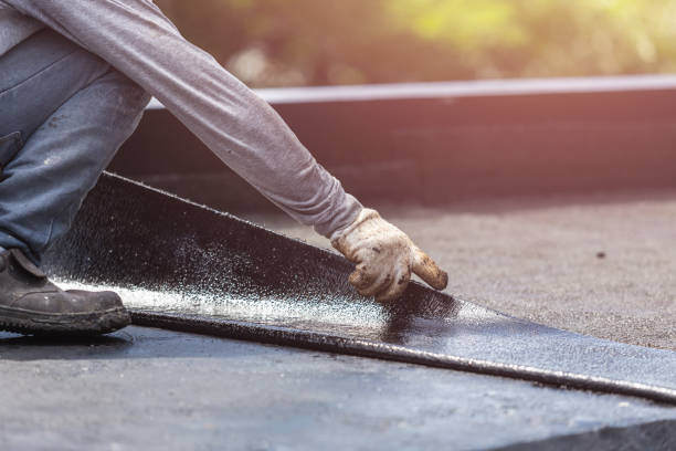 Professional Waterproofing technician working in Valhermoso Springs, AL
